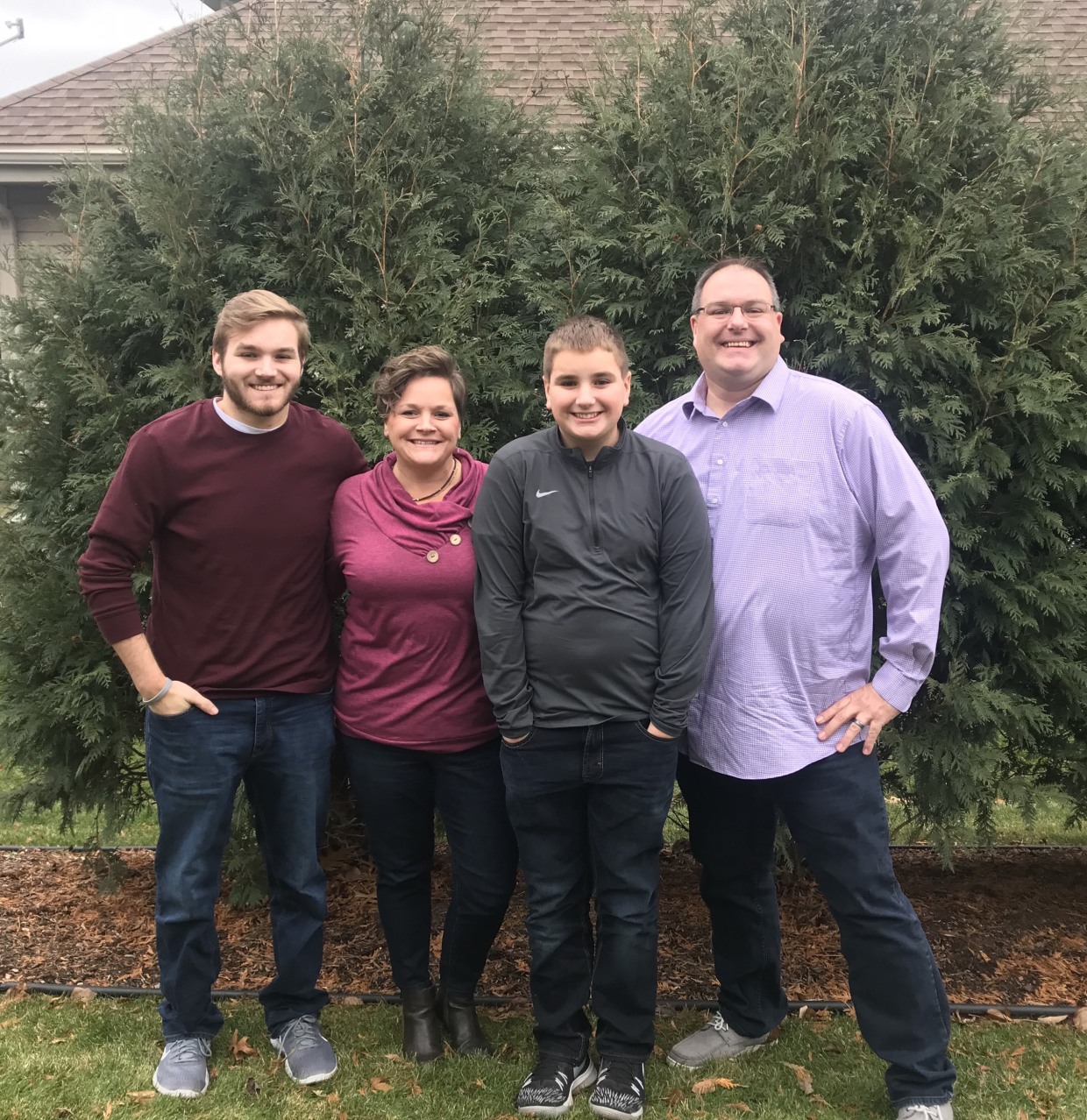 Cole Schmidtknecht, left, his mother, Shanon, his brother, Dane, and father, Bil.
