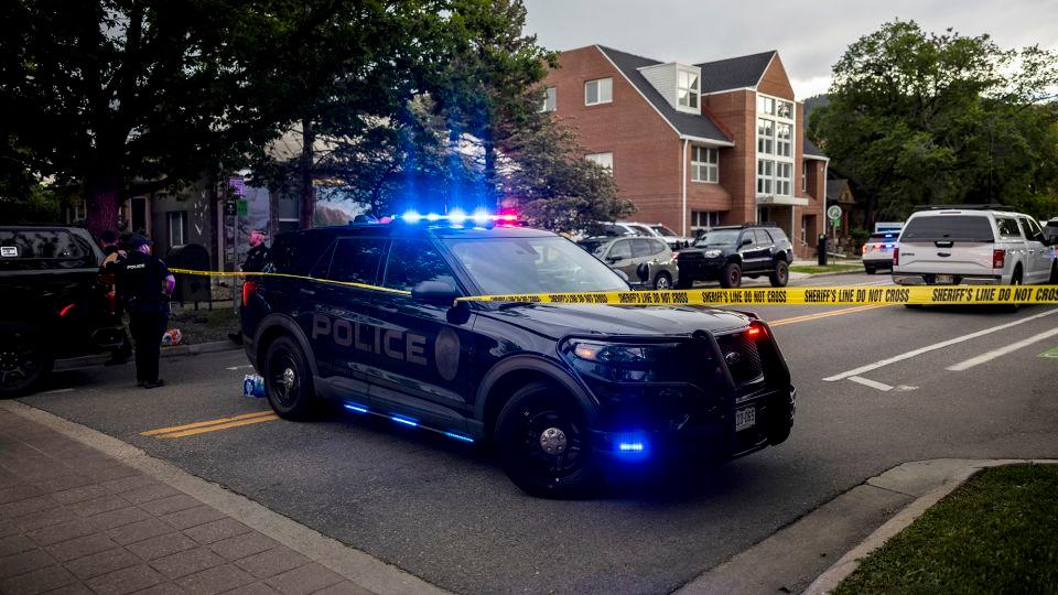 Police cordon off Pearl Street in Boulder, Colorado, on Sunday. - Chet Strange/Getty Images