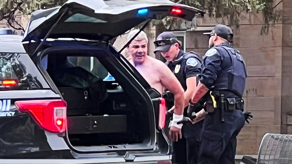 Law enforcement officers detain a suspect in Boulder on Sunday. - OpusObscura/X/Reuters