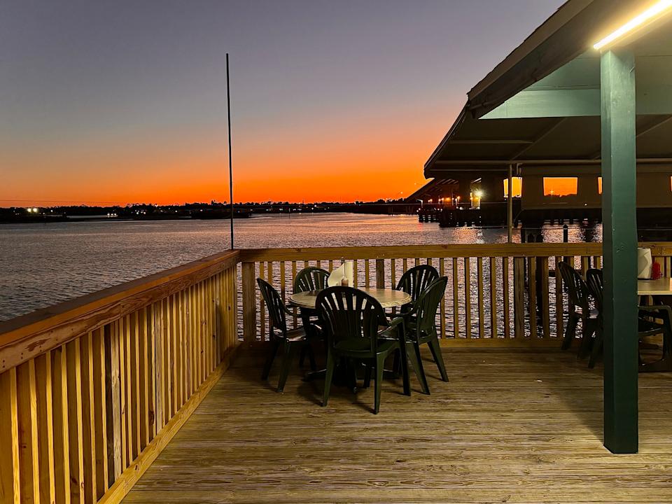 Sunset views from Our Deck Down Under's outdoor dining space in Port Orange.