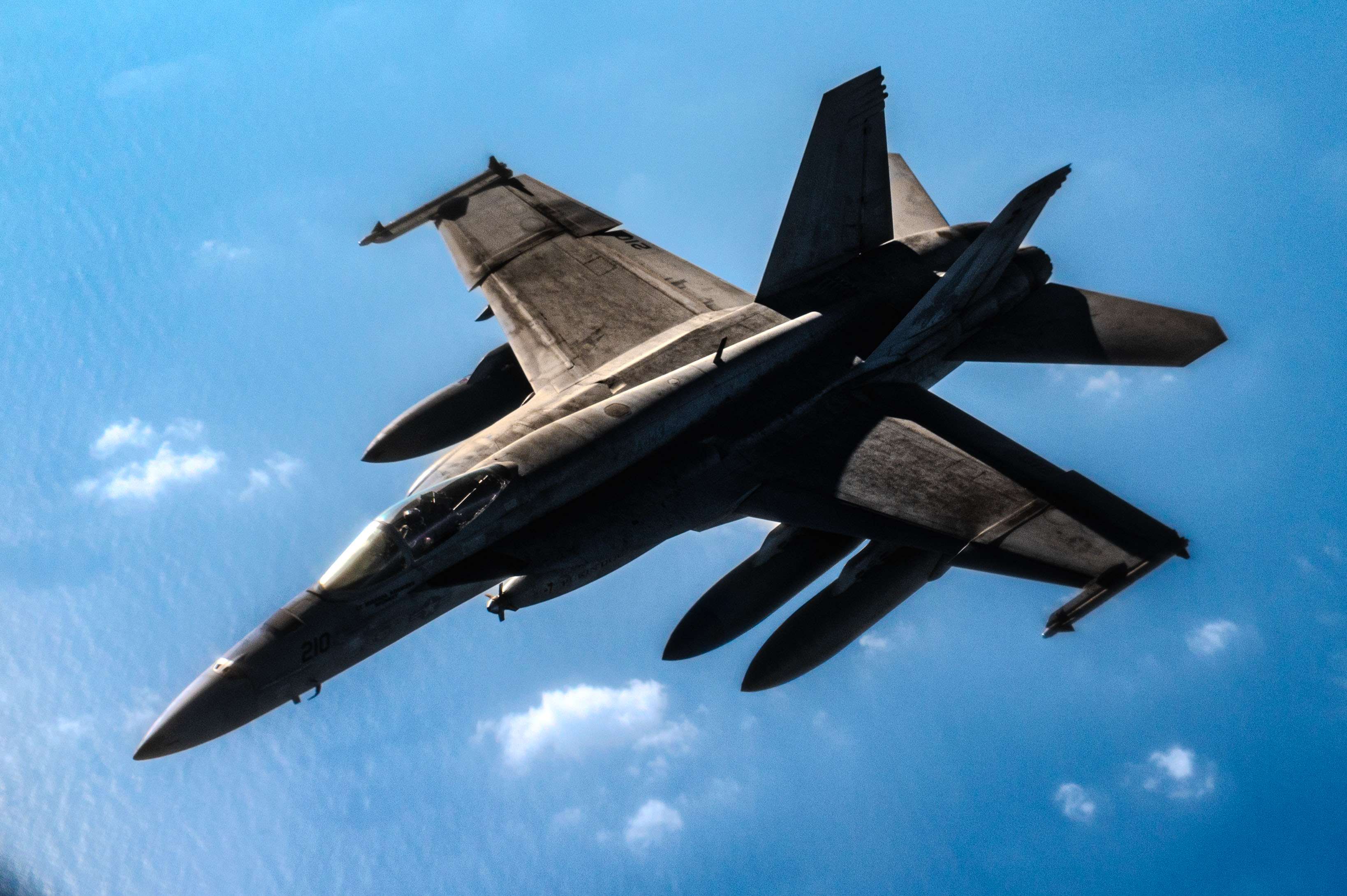 A U.S. Navy F/A-18E Super Hornet, assigned to the USS Harry S. Truman Carrier Strike Group, flies a mission over the U.S. Central Command area of responsibility, Feb. 1, 2025. The Super Hornet is deployed to the U.S. 5th Fleet area of operations to support maritime security and stability in the Middle East region. (U.S. Air Force photo by Staff Sgt. Jackson Manske)