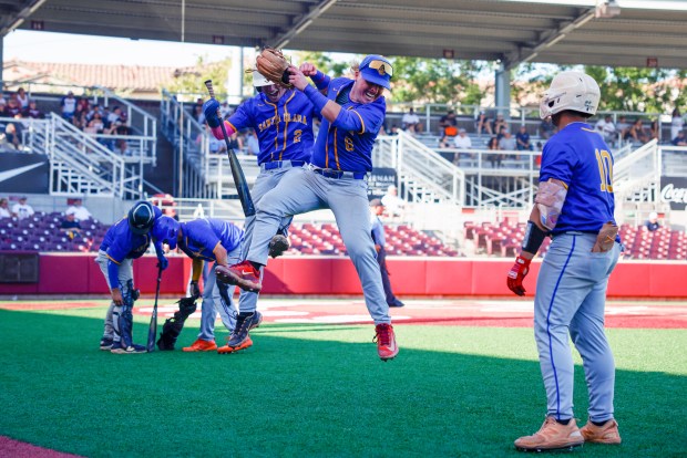 Santa Clara's Connor Houle (2) and Santa Clara's John Kepner (6) jump in celebration after scoring against St. Francis SCP in the sixth inning during the Division IV CCS championship game at Santa Clara University's Stephen Schott Stadium in Santa Clara, Calif., Friday, May 30, 2025. (Shae Hammond/Bay Area News Group)