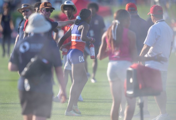 North Salinas' Clara Adams celebrates by setting off a fire extinguisher in the infield after winning the Girls 400 Meter Dash during the CIF State Track and Field Championships on Friday at Buchanan High in Clovis on Saturday, May 31, 2025. (Photo by Terry Pierson, The Press-Enterprise/SCNG)