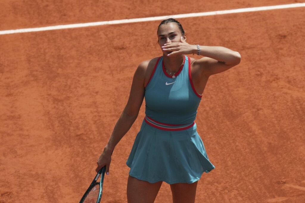 Top-ranked Sabalenka overcomes Zheng and windy...