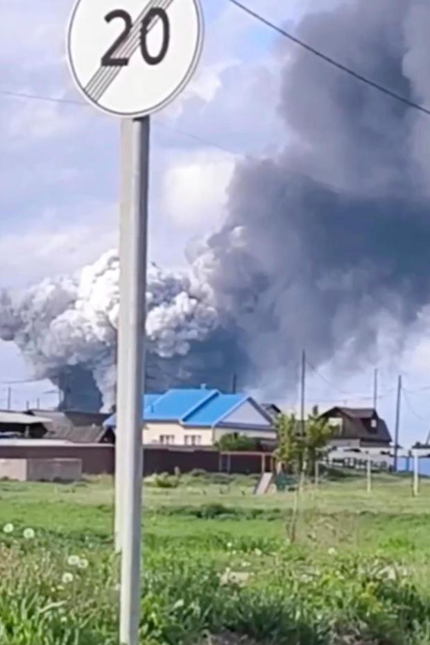 Plumes of smoke are seen rising over the Belaya air base in the Irkutsk region in eastern Siberia