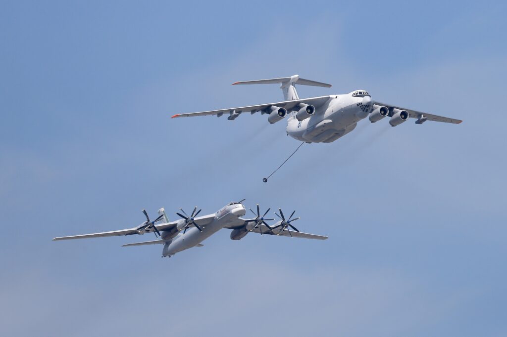 MOSCOW, RUSSIA - MAY 9: In this handout image supplied by Host photo agency / RIA Novosti, An Ilyushin Il-78 Midas air force tanker and a Tupolev Tu-95MS Bear strategic bomber during the military parade to mark the 70th anniversary of Victory in the 1941-1945 Great Patriotic War, May 9, 2015 in Moscow, Russia. The Victory Day parade commemorates the end of World War II in Europe. (Photo by