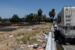 As brush fire nears S.J. homeless...