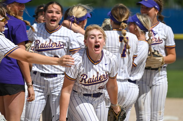 A player cheers with her team