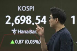 Asian shares slide as Russia-Ukraine conflict,...
