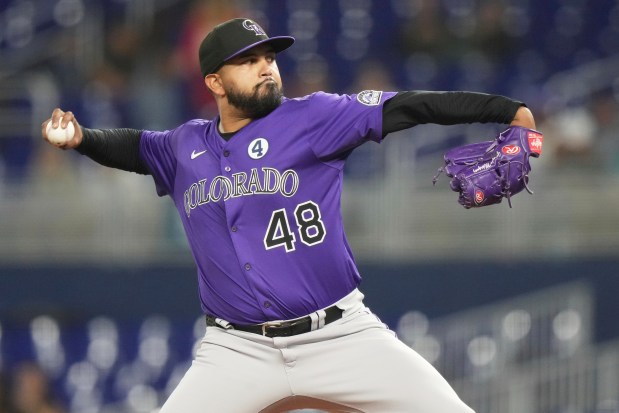 Colorado Rockies starting pitcher German Marquez (48) throws during the first inning of a baseball game against the Miami Marlins, Monday, June 2, 2025, in Miami. (AP Photo/Lynne Sladky)