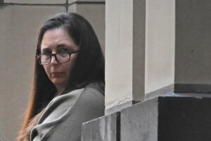 Woman on trial for killing 3...