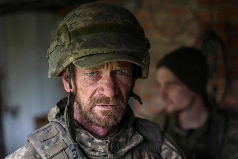 A serviceman of the 68th Separate Chasseurs Brigade of the Ukrainian Armed Forces poses for a picture after he came back from a combat mission, amid Russia's attack on Ukraine, near the town of Pokrovsk in Donetsk region, Ukraine May 26, 2025.