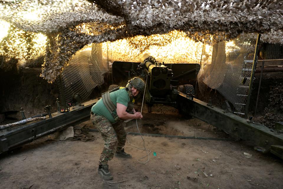 A serviceman of the 15th 'Kara-Dag' Brigade of the Operational Assignment of the National Guard of Ukraine fires a 2A36 Giatsint-B howitzer towards Russian troops, at a position on a front line near the town of Kupiansk, amid Russia's attack on Ukraine, in Kharkiv region, Ukraine May 27, 2025.